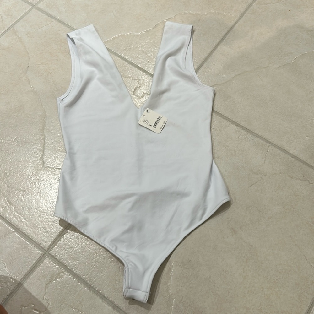 Brand new with tags free people body suit